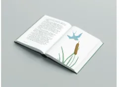 The printed book open on the swallow spread